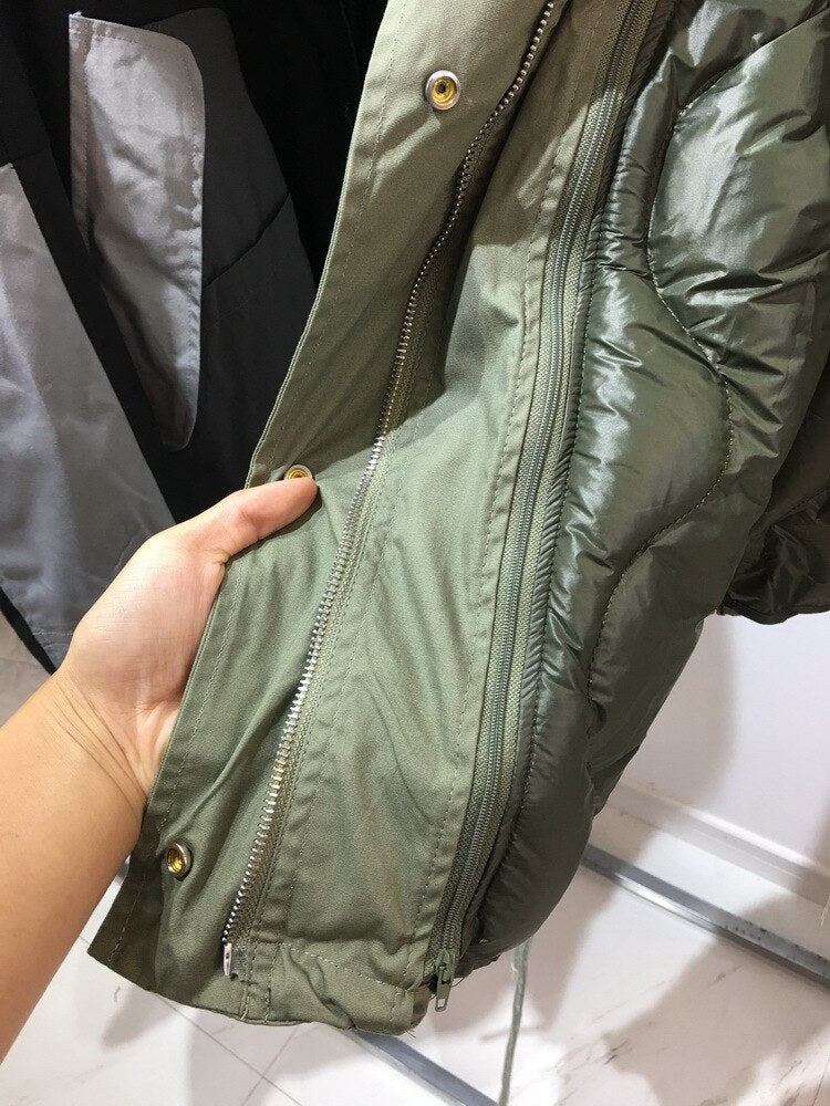 Army green jacket with detachable liner.