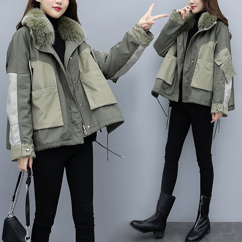 Army green jacket with detachable liner.